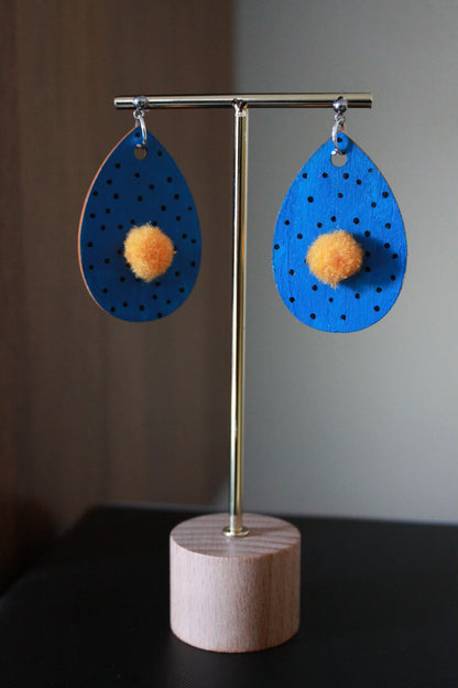 Blue with Black Polka Dots and Yellowish-Orange Pom Pom Teardrop Earrings