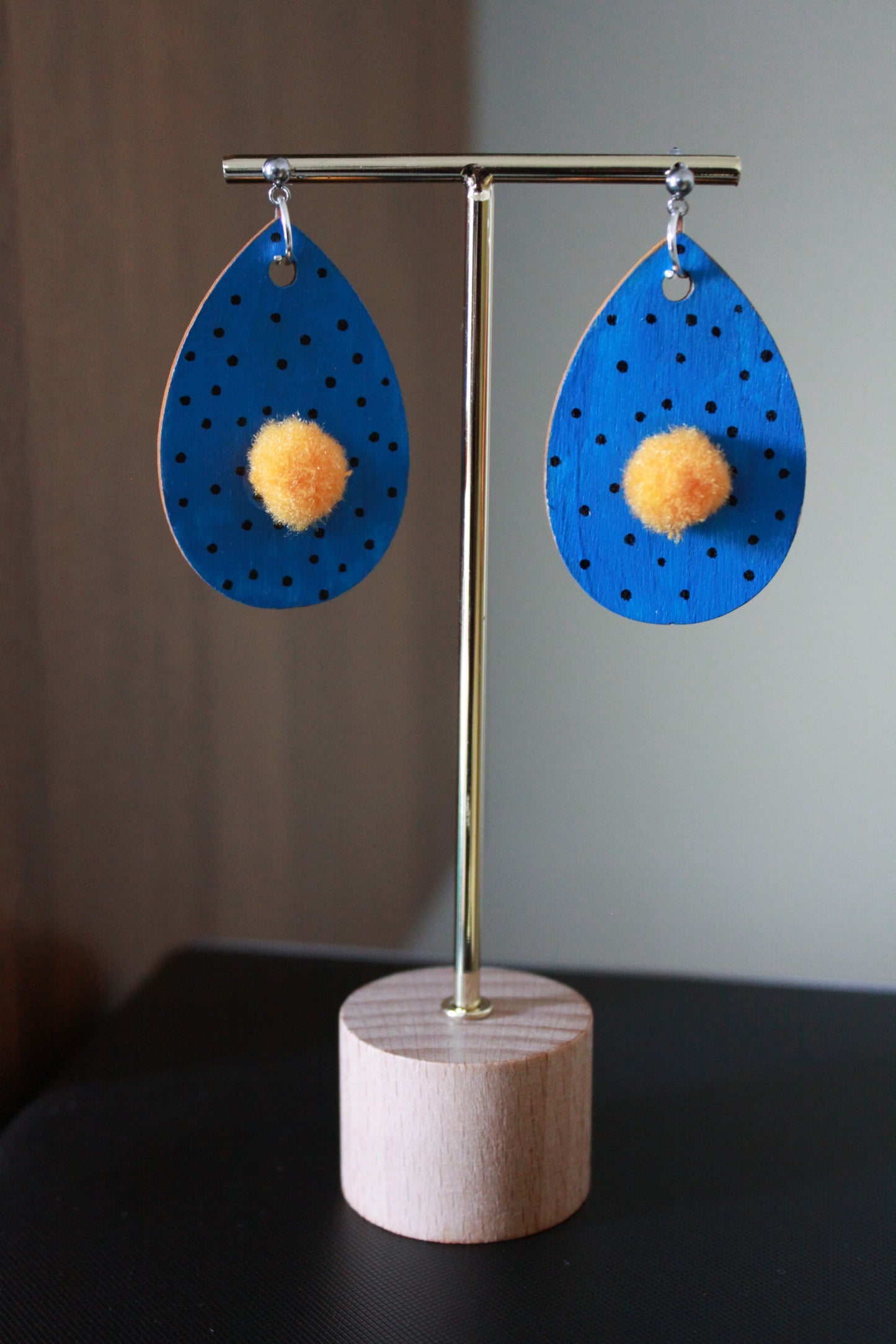 Blue with Black Polka Dots and Yellowish-Orange Pom Pom Teardrop Earrings